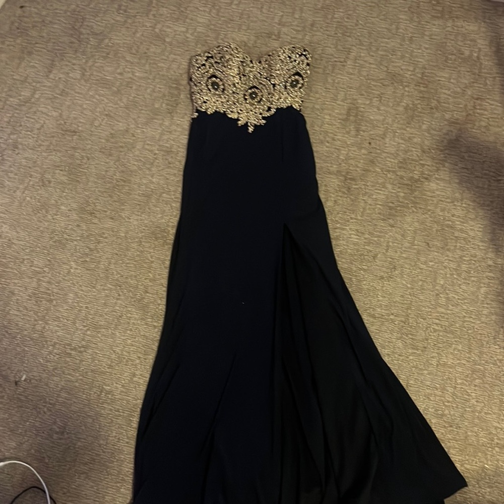 Strapless prom dress with a slit size 4 navy and gold details